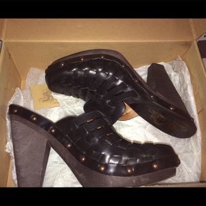 Black leather mules. Only worn once.